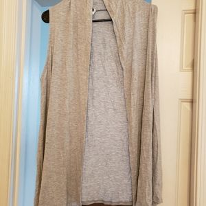 Sleeveless ultra lightweight and soft Cardigan. Like new.